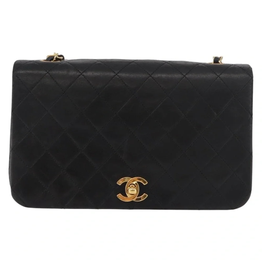 CHANEL Black Quilted Leather Shoulder Bag with Gold Hardware